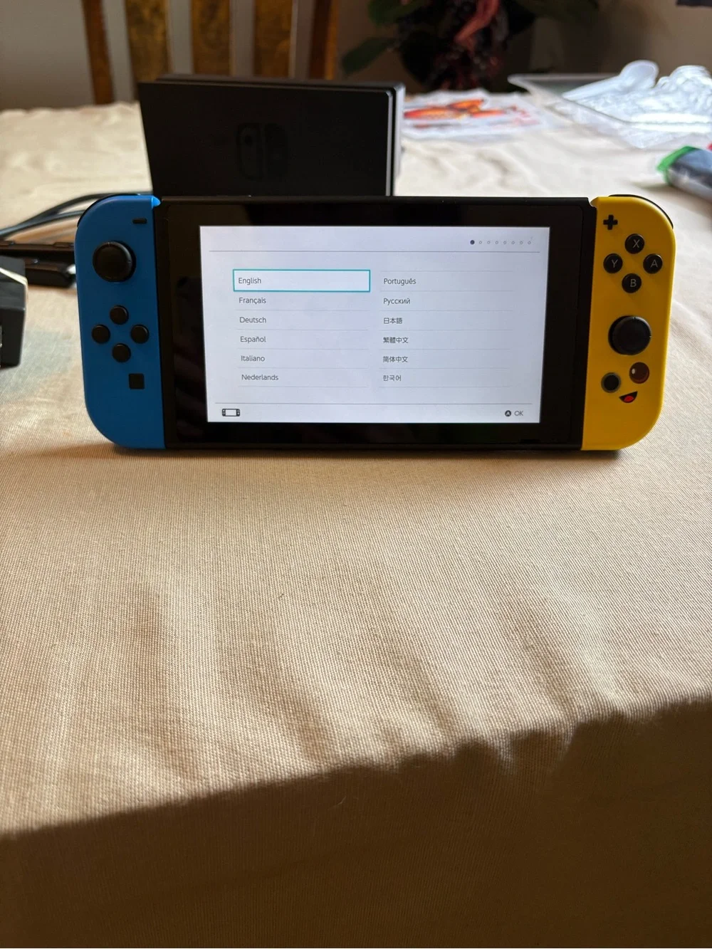 Nintendo Switch with Blue Left and Yellow Right Joy‑Con Controllers